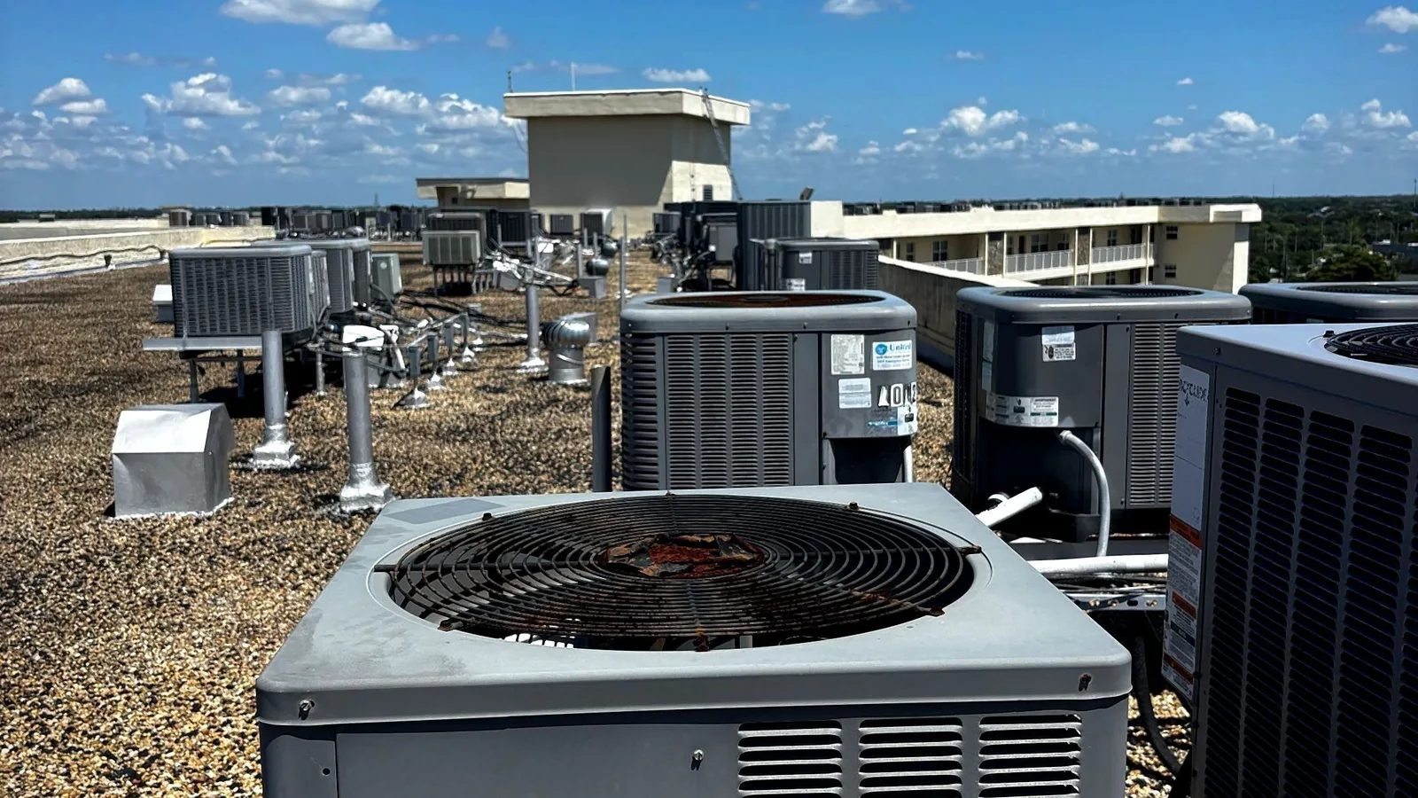 Rooftop condenser field on a multi-unit residential building