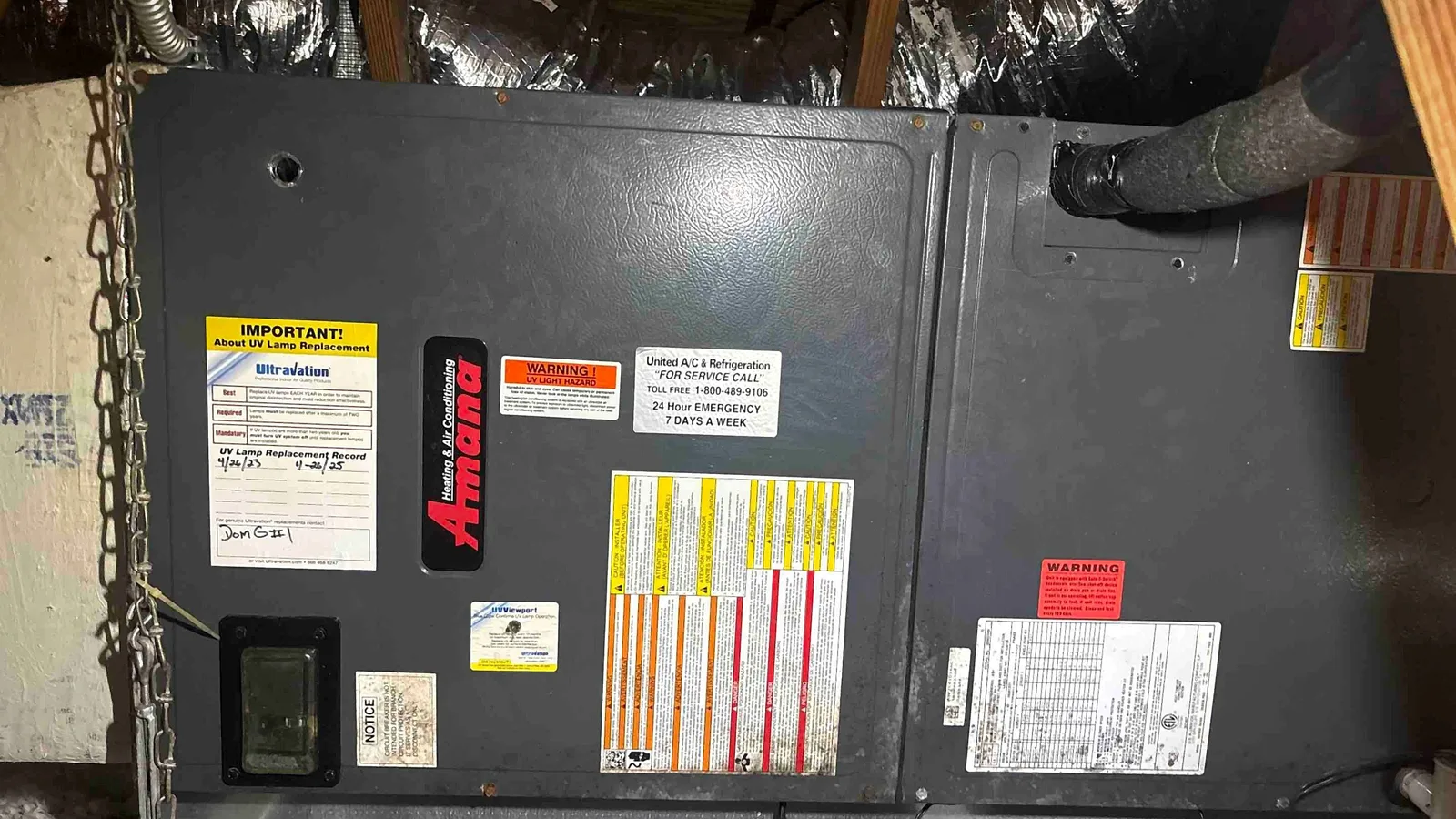 Horizontal Amana attic air handler with UV lamp air purification and service record card